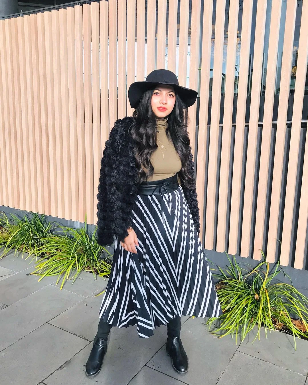 Chic Winter Wonderland: Faux Fur & Striped Skirt Glam